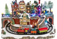 Weihnachtsdorf deko mit eisenbahn